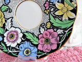 Dramatic Rosina Floral Cup And Saucer Hand Colored 1930s Black and Chintz Bands