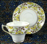 Rosina England Hand Colored Cup and Saucer Yellow Dog Roses On Brown Transfer