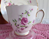 Delicate Pink Rose Cup and Saucer Crown Staffordshire England 1950s Purple Flowers
