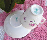Delicate Pink Rose Cup and Saucer Crown Staffordshire England 1950s Purple Flowers