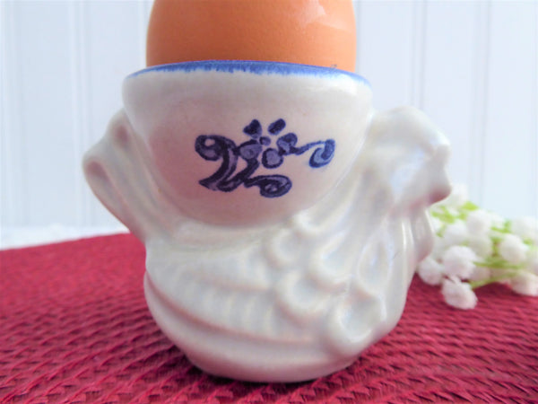 http://www.antiquesandteacups.com/cdn/shop/products/1995-Pfaltzgraff-chicken-eggcup-pair-b_grande.jpg?v=1579892753