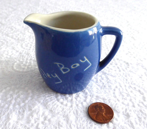 English Devon Ware Blue And White Whitely Bay Souvenir Mini Creamer 1920s