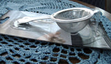 Teapot Finial Tea Strainer With Handle Over Cup Tea Leaf Strainer On Card