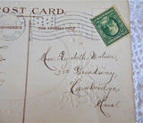 Postcard Christmas Greetings Embossed Snow Scene Holly 1909 Calligraphy