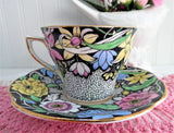 Dramatic Rosina Floral Cup And Saucer Hand Colored 1930s Black and Chintz Bands