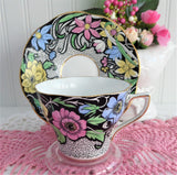 Dramatic Rosina Floral Cup And Saucer Hand Colored 1930s Black and Chintz Bands
