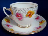Roslyn Art Deco Tea Cup And Saucer Sweet Pea Pink Yellow Hand Painted 1930s