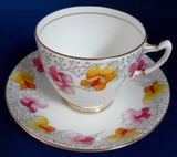 Roslyn Art Deco Tea Cup And Saucer Sweet Pea Pink Yellow Hand Painted 1930s