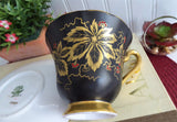 Elegant Black Cup And Saucer Metallic Gold Leaves Red Enamel Tuscan 1940s