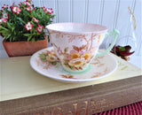 Blush Pink Wild Roses And Trees Cup And Saucer Art Deco Hand Colored Transferware 1940s