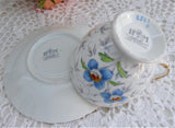 Floral Cup And Saucer Enamel 1940s Hand Colored Chintz Leaves Hudson And Middleton