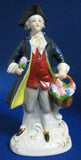 Occupied Japan Figurine 18th Century Man With Flower Basket Hand Painted 1945-1952