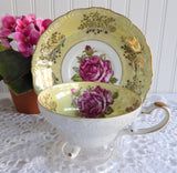 Yellow Luster Cup And Saucer Three Feet Pink Rose Gold Overlay 1950s