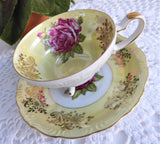 Yellow Luster Cup And Saucer Three Feet Pink Rose Gold Overlay 1950s