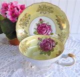 Yellow Luster Cup And Saucer Three Feet Pink Rose Gold Overlay 1950s