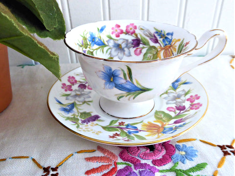 https://www.antiquesandteacups.com/cdn/shop/products/1950s-Shelley-Spring-Bouquet-demi-teacup-Gainsbotough-a_large.jpg?v=1605625745