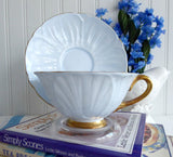Shelley Footed Oleander Blue Rose Pansy FMNot Cup And Saucer Burnished Gold