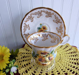 Fancy Yellow Daisies Cup And Saucer Gold Overlay English Bone China 1950s Windsor