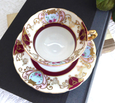 Fancy Hand decorated Cup And Saucer 1950s Japan Maroon Pink Gold Heart Bouquets