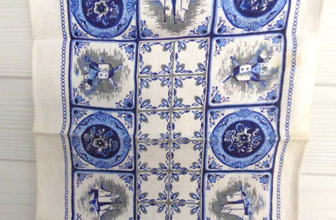 https://www.antiquesandteacups.com/cdn/shop/products/1950s-linen-delft-pattern-pair-placemats-c_large.JPG?v=1532834665
