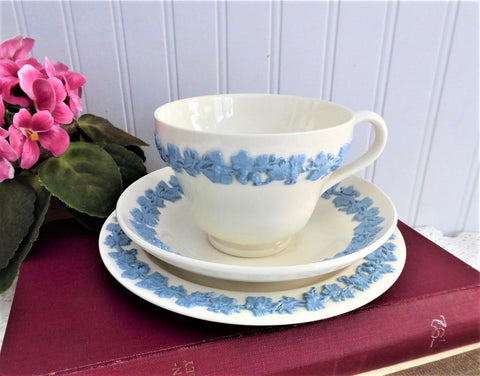 https://www.antiquesandteacups.com/cdn/shop/products/1960s-Wedgwood-embossed-queensware-blue-on-white-teacup-trio-a_9cd1f607-6040-4d39-b5c8-687f16d6bc58_large.jpg?v=1650391470