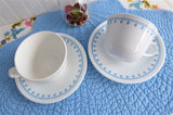 Snowflake Garland Cups and Saucers 2 Corelle 1970s Blue And White Milk Glass
