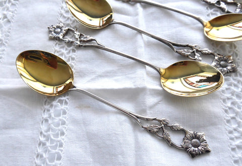 https://www.antiquesandteacups.com/cdn/shop/products/1970s-gold-washed-silver-flower-spoons-boxed-c_large.JPG?v=1501462001