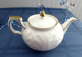 Elegant Aynsley Golden Crocus Teapot Petal Molded White And Gold 1985-1989 20 Oz