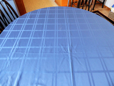 https://www.antiquesandteacups.com/cdn/shop/products/1990s-large-oval-blue-tablecloth-g_large.JPG?v=1523294622