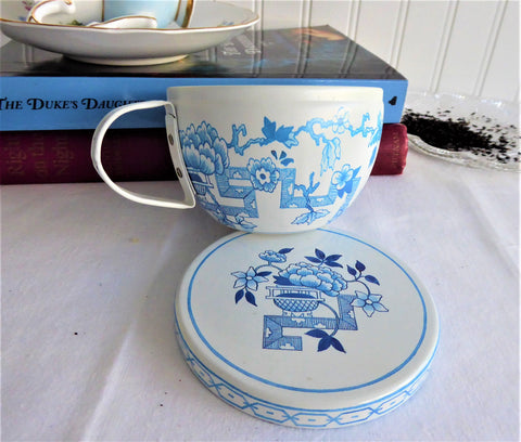 https://www.antiquesandteacups.com/cdn/shop/products/1997-teacup-shape-tea-tin-blue-white-g_large.JPG?v=1564617052